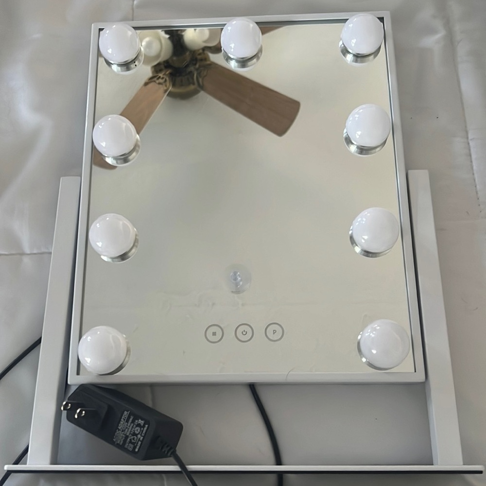 small vanity mirror , comes with cord to plug in